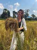 Our Category Manager Maartje in the organic rice fields in Cambodia