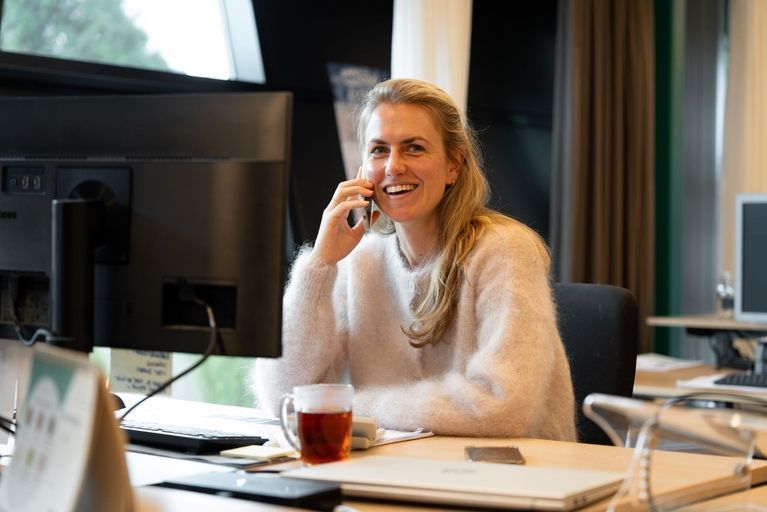 Rhodee on the phone